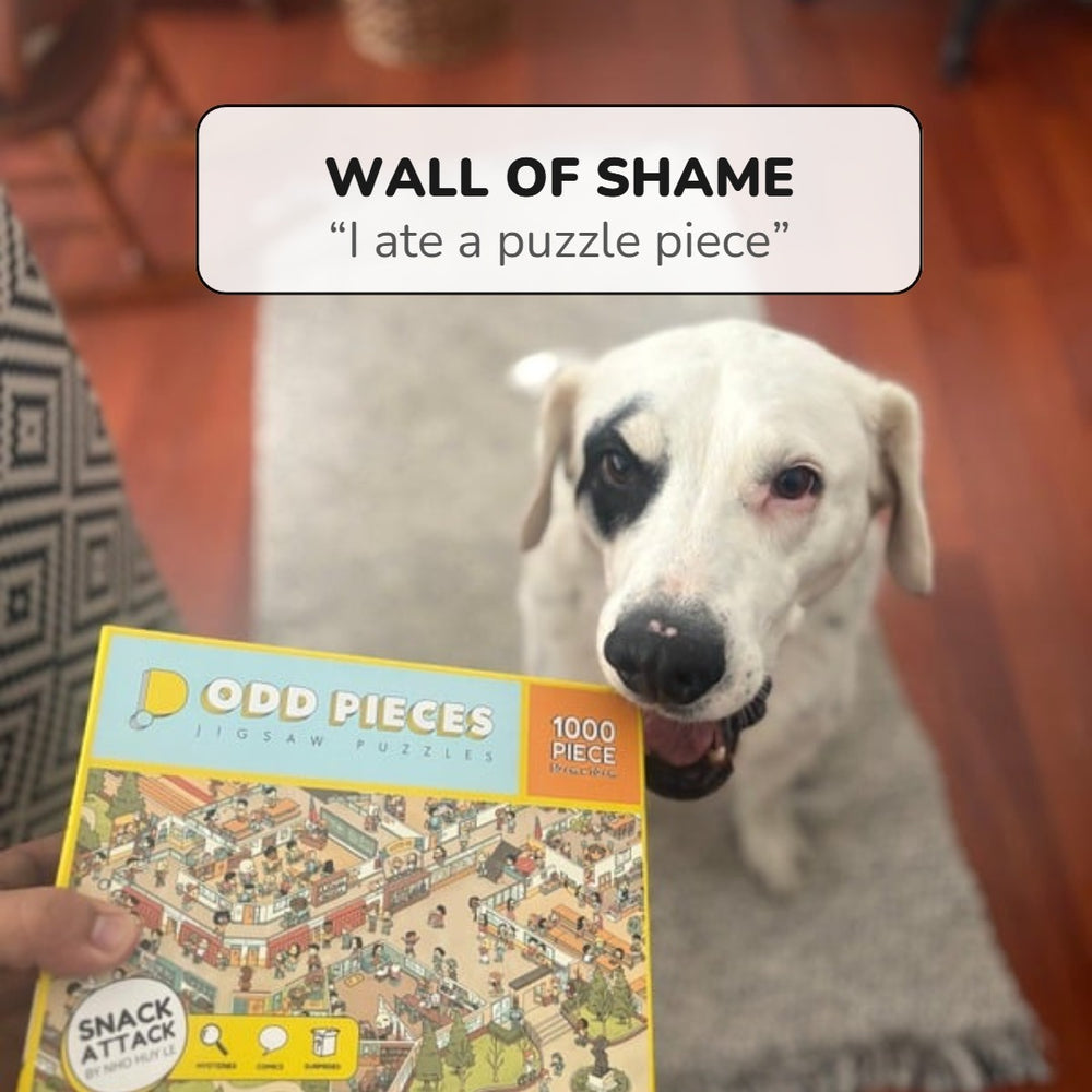 Wall of shame: a dog next to an Odd Pieces box, 'I ate a puzzle piece'