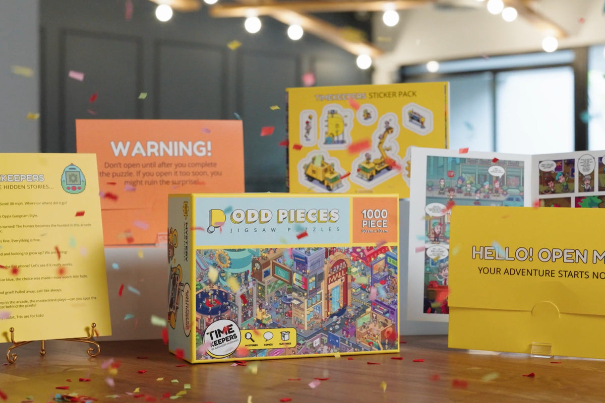 Odd Pieces puzzle boxes laid out as gifts, one for each kid